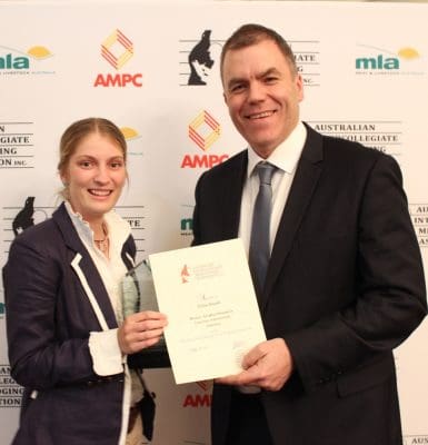Founders Buckle winner, UQ's Chloe Gould receives her award from AMPC director Tom Maguire.
