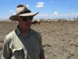 Bob Katter in a drought-affected paddock near Richmond.