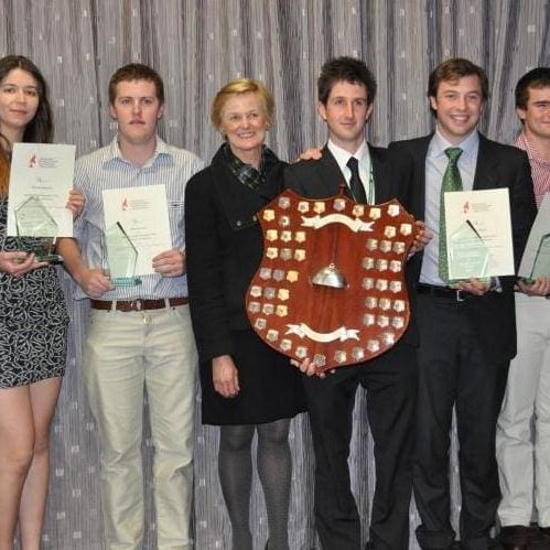 Champion Team award winners(L-R) Alister Knight (coach), Natasha Roman, Matt Lawless, Lucinda Corrigan (MLA), Tristan Smith, Tim Ryan, Geoffrey Bullen, and coaches Rashelle Levonian and Hyatt Frobose.