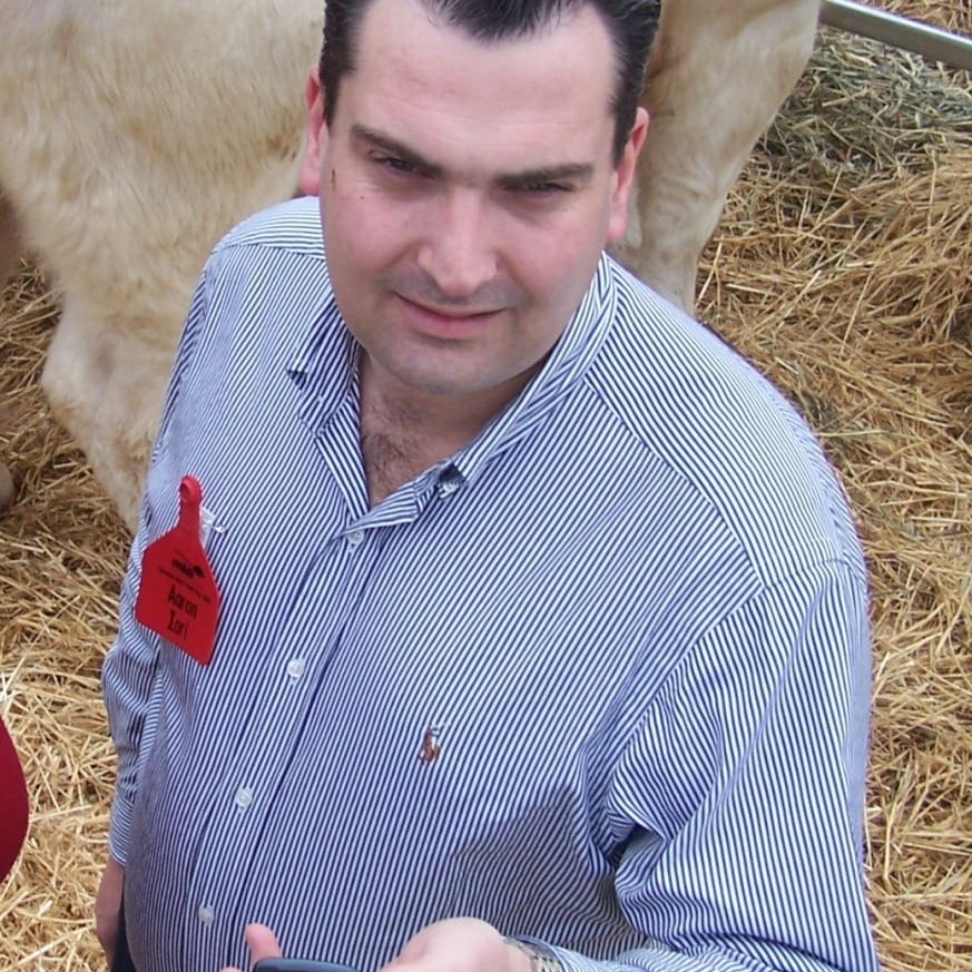 The late Aaron Iori demonstrates direct download capability for NLIS data using a mobile phone during a Queensland Meat Profit Day in 2008