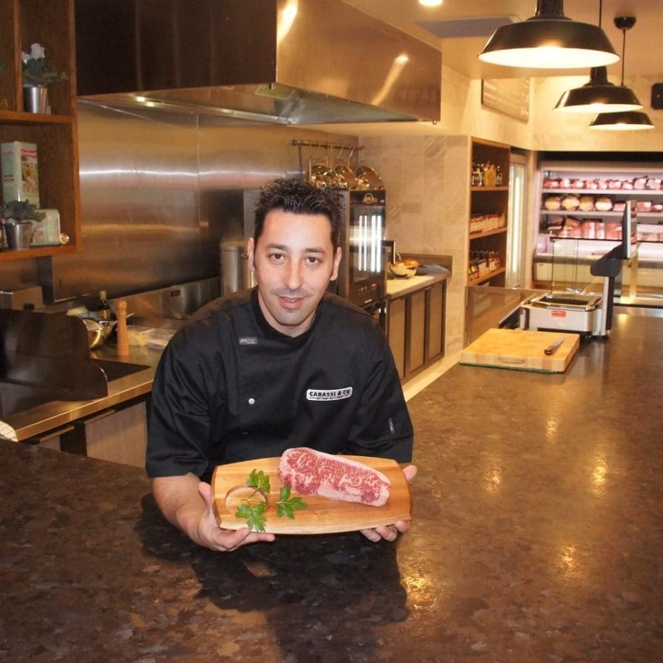 Chef Shalom Bitton prepares a Wagyu steak in the Butcher's Kitchen area. Click on images at base of page for a larger view