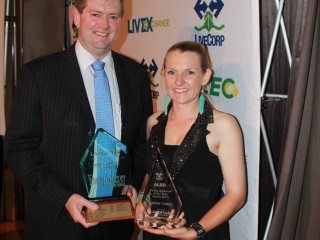 Landmark's Cameron Hall presents Gemma Lomax from Wellards with the Young Livestock Export Achiever Award.