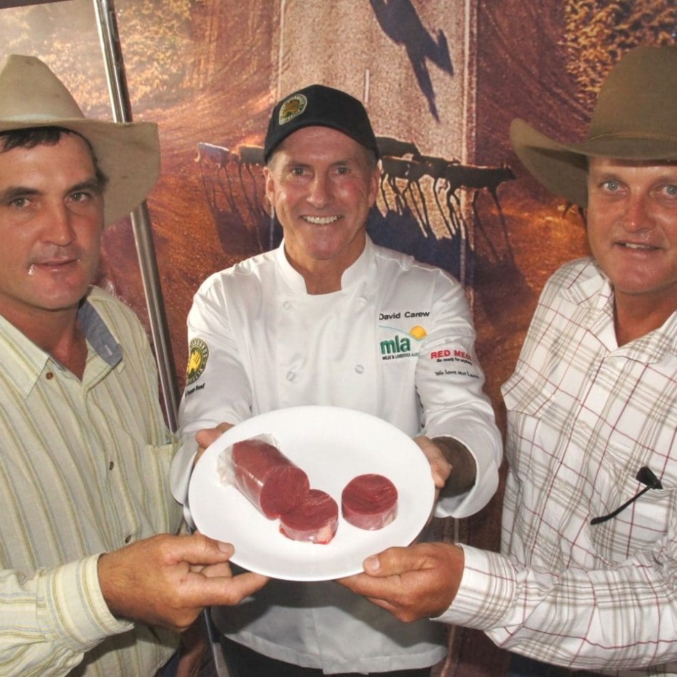 David Carew, centre, displays products developed using the SureShape technology to cattlemen attending last year's Bef 2012 event in Rockhampton.