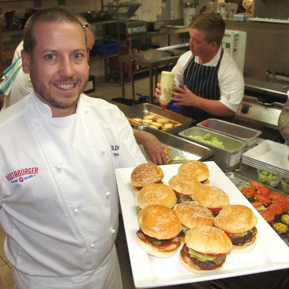 Daniel Wilson with kid's sized samples of his Huxtaburgers served to Wagyu Conference delegates in Geelong recently  