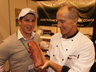 T&R Pastoral's Jonathan Bayes and MLA project manager, product innovation David Carew with a sample of muscle-meat put through the SmartShape process, showcased during the recent Retail Innovation Expo.