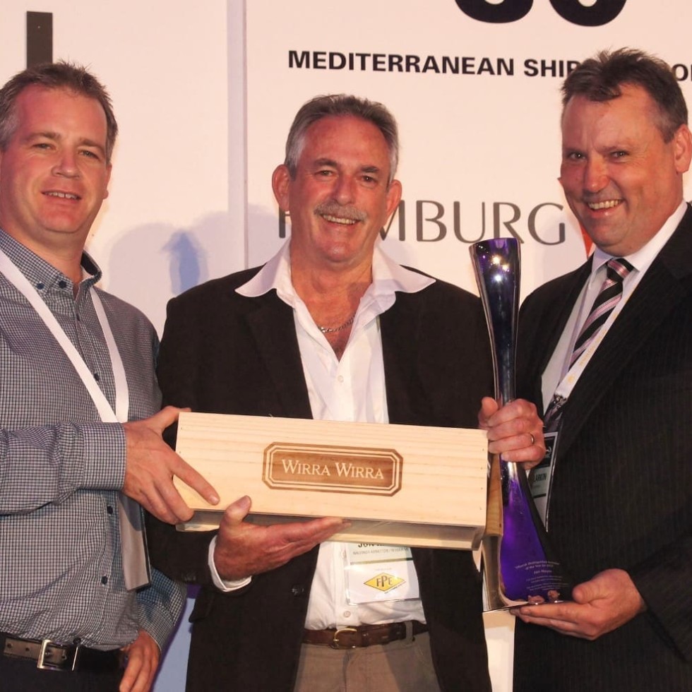 Wodonga's Jon Hayes, centre, is inducted as one of AMIC's Distinguished Australians by Maersk Line's Nicholas Long and AMIC processor chairman David Larkin.