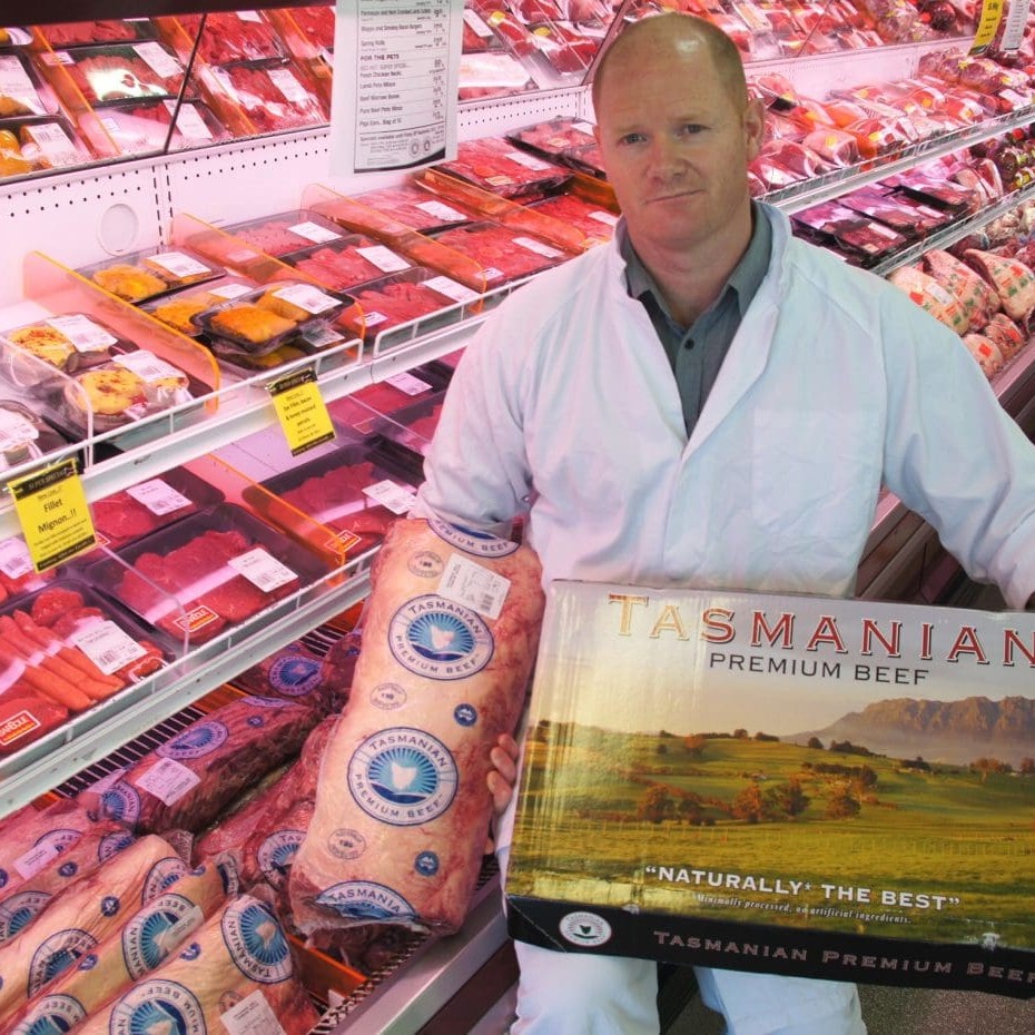 Longford's large format retail outlet at its front gate, managed through DR Johnston, attracts customers from across the northern half of Tasmania. Paul Wightman is pictured with a sample and carton lid from the Tasmanian Premium program 