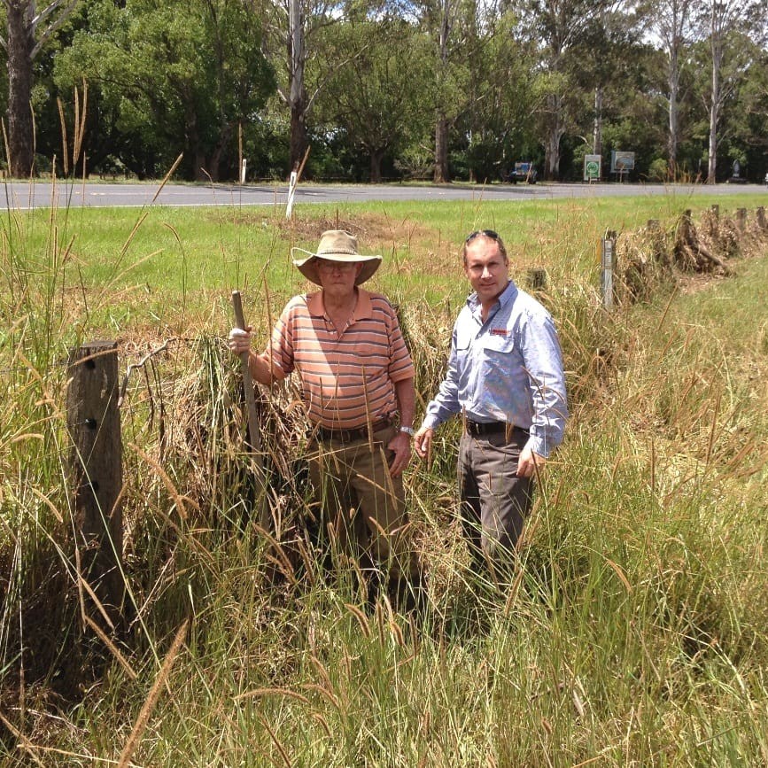 Waratah's Andy Divall helping Lismore local Ian Campbell clear debris following the recent floods