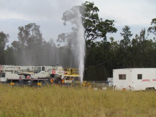 Emergency crews working to secure a gas well blow out west of Dalby yesterday morning. 