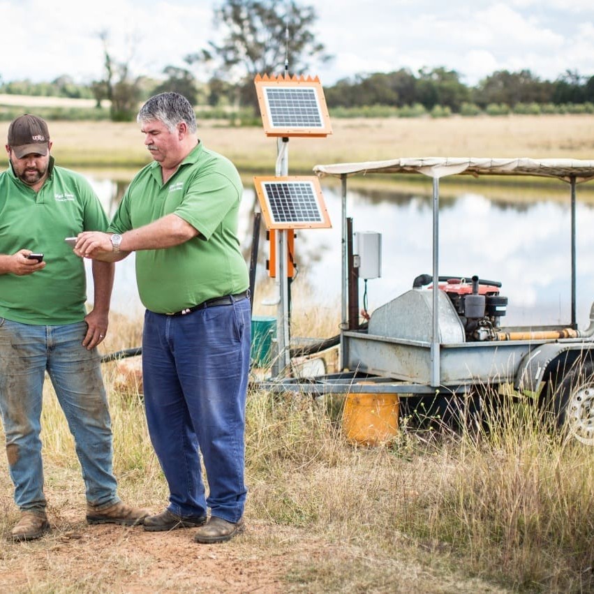Ric and Luke Harvey monitor stockwater conditions via their mobile phones, using the M2M technology