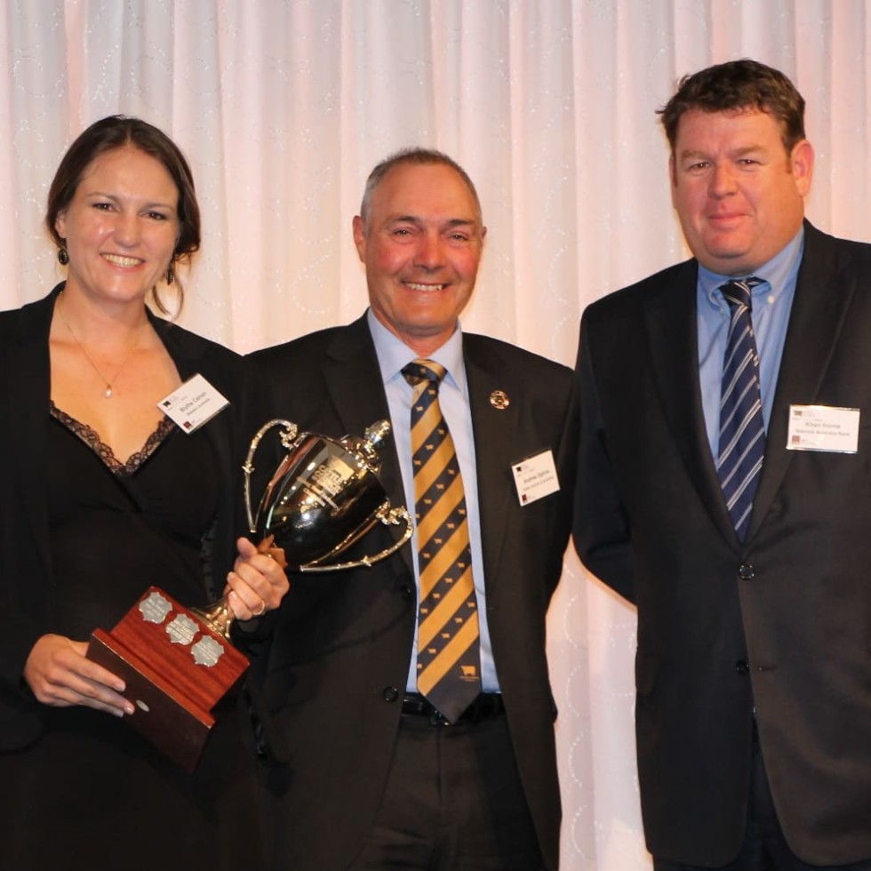 2014 NAB Agribusiness Rising Champion Blythe Calnan is congratulated by CCA president Andrew Ogilvie and NAB Agribusiness's Khan Horne