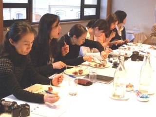 Japanese women involved in the Iron Beauty marketplace visit to Australia sample beef in a blind taste test in Sydney  