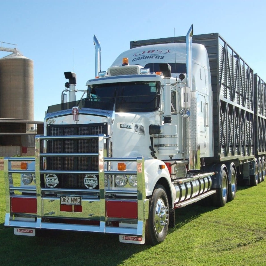 JBS Carriers prime mover beside the distinctive grain storage facility at Beef City feedlot