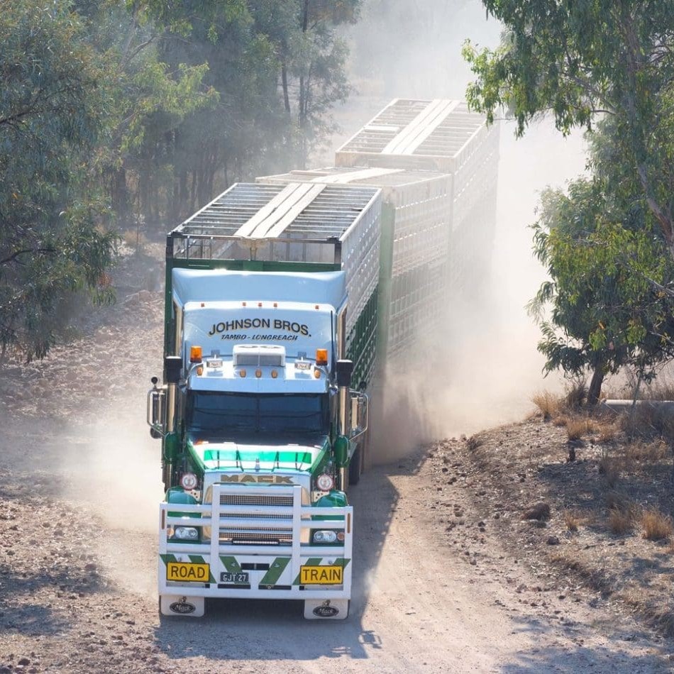 Johnson Bros Mack coming out of a creek crossing during a run in western Queensland