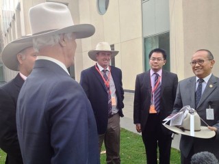 'You are now one of us": Bob Katter presents Indonesian ambassador Nadjib Riphat Kesoema wth an Akubra Arena.