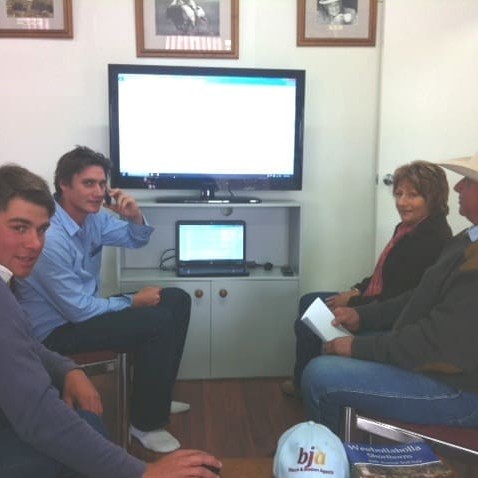 Macintyre Station's Tony Keate, right, and BJA staff log in for a Friday Auctions-Plus sale 