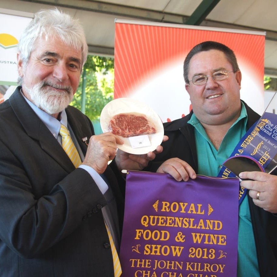 Grant Coleman from Wingham Beef Exports and head judge, Russell Smith with the winning Manning Valley Naturtally entry which was judged Brisbane's grand champion branded beef of show