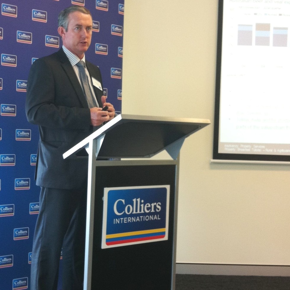Colliers' Rawdon Briggs addresses the Brisbane investor briefing