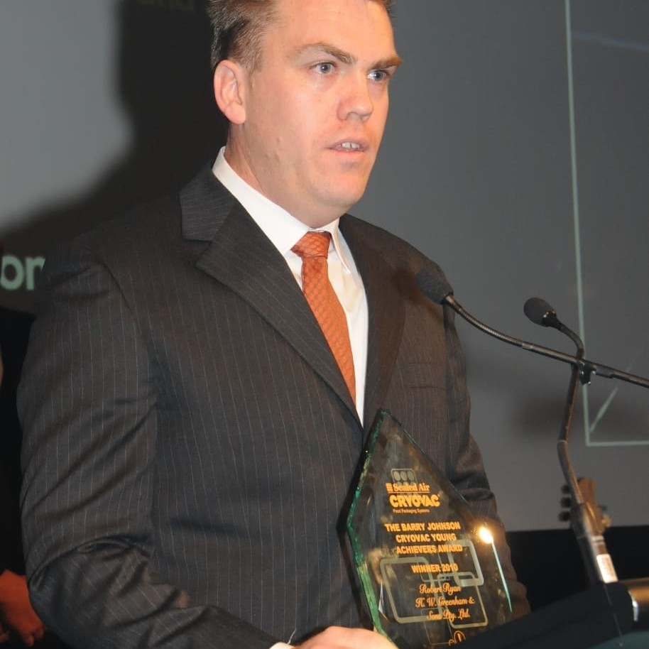 Robert Ryan collects his Future Industry Leaders award at AMIC's 2008 conference  