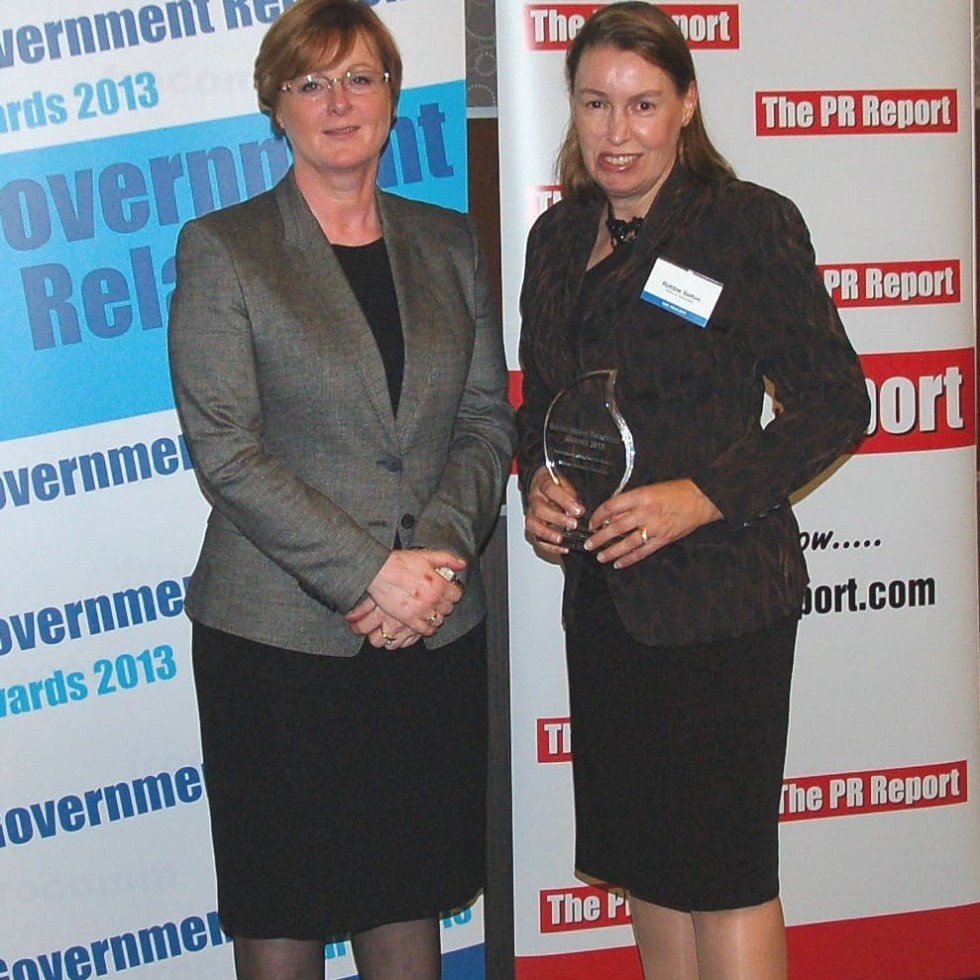 Sefton & Associates' Robbie Sefton accepts the award for Government Relations Consultancy of the Year from WA Senator-elect, Linda Reynolds. 