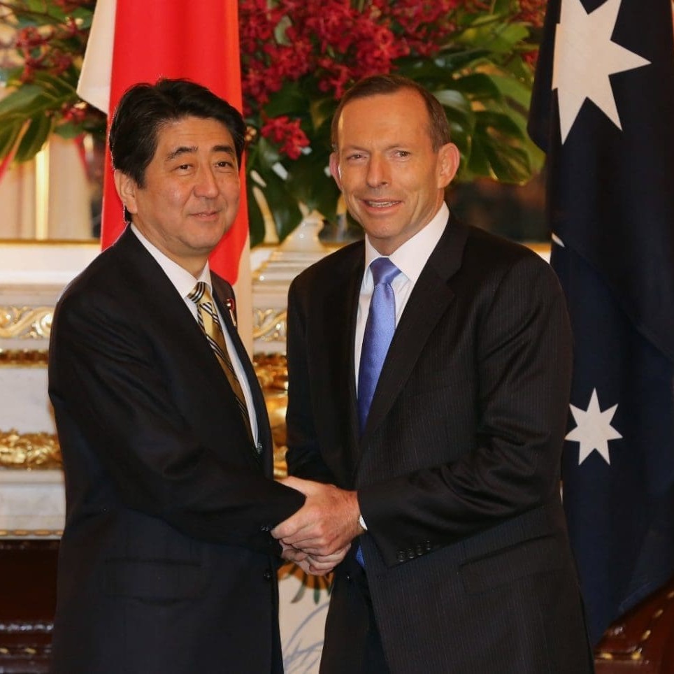Prime Ministers Shinzo Abe and Tony Abbott pictured after reaching agreement over an FTA last night   
