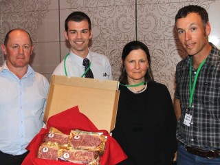 AA Co's Kevin Casey and Brad de Luca display the Master Kobe sample box bought for $2500 by Jane Hughes, Hughes Grazing, Nebo during the charity auction, with auctioneer, Enoch Bergman