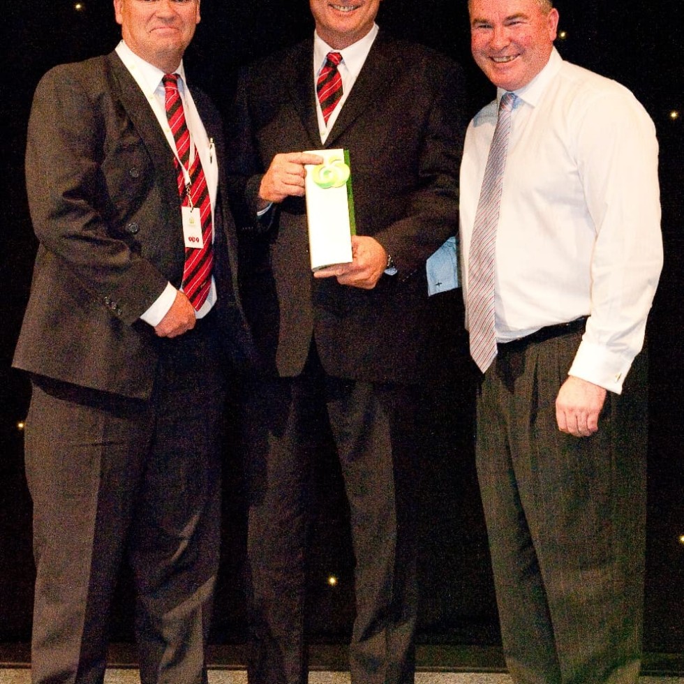 Killara manager Tony Fitzgerald, and trading manager Andrew Talbot receive the 2012 supplier award from Woolworths frersh food general manager Pat McEntee