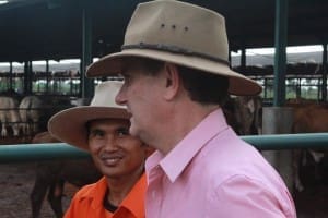 Dick Slaney and his head stockman Misni discuss the day's work ahead.