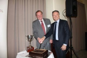 Former CCA executive director David Palmer and shadow agriculture minster Joel Fitzbiggon cut Cattle Council's 35th anniversary cake in Canberra on Wednesday night.