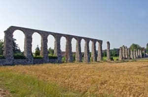 The Roman aqueduct near the Luynes in Indre-et-Loire, central France, is the only remnant of the ancient city of Malliacum. Water management infrastructure such as the Luynes aqueduct were central to providing the Romans with stable water supplies in regions with variable and dry climates.