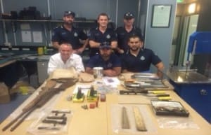 Queensland Police with a quantity of meat, knives, mobile phones, drug paraphernalia, three vehicles and a number of firearms recovered during the raids.