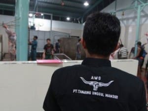 An animal welfare officer at work in the TUM abattoir in Jakarta.