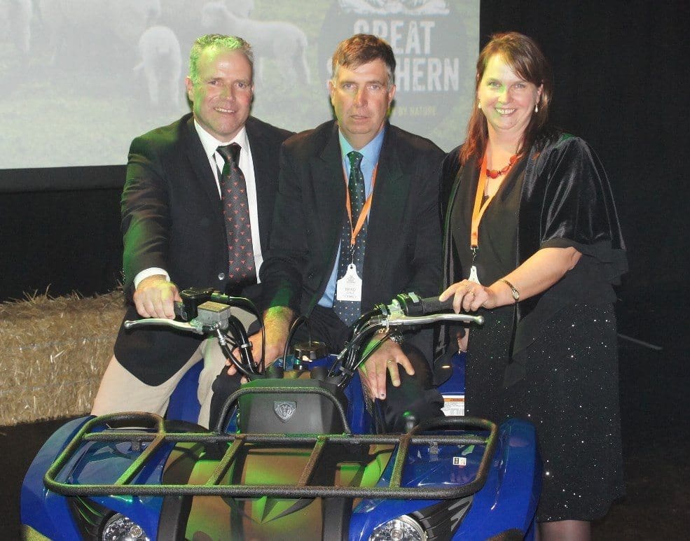 Brad and Irene Gale, pictured with JBS Southern livestock manager Steve Chapman, try out their new Yamaha quad bike which they collected as the major prize in the JBS Great Southern Beef Supplier of the Year awards held in Melbourne on Friday night.