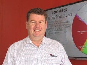 Khan Horne in front of one of the digital displays in NAB's Social media command centre at Beef 2015
