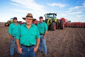 Ceres Ag MD Mark Mason (middle), with cropping manager, Ben Hurley and northern GM James Walker, with two Claas Axion 950 advanced technology tractors towing Morris airseeders.