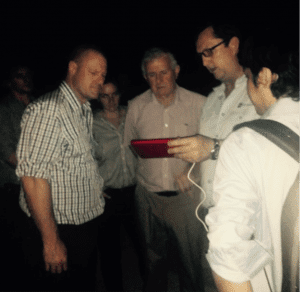 Global Compliance’s Brian Scott demonstrating the features of the patented black box (which is actually red) to Peter Dundon (MLA) and Simon Crean (ALEC) in Hanoi last month.