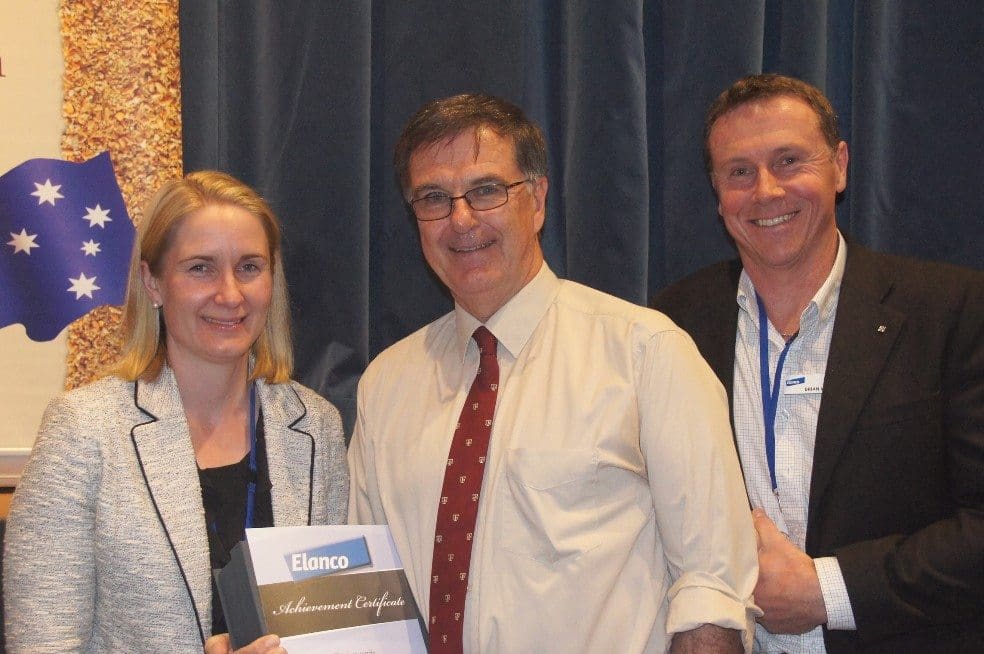 FSA Consulting's Dr Peter Watts is congratulated by Elanco's Lisa Jamieson and Brian Walker after receivin g the 2015 Elanco award for Distinguished Service to the feedlot industry