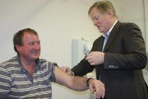 Hamilton's Dr Dale Fordgives Casterton (VIC) livestock carrier Mick Smith his Q Fever vaccination.