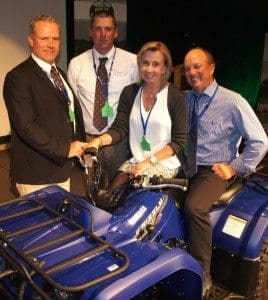 Lamb producers of the year Scott and Kate Bowden, from Bothwell, try out their new quad-bike prize with JBS Southern livestock manager Steve Chapman and their local JBS buyer, Drew Skinner. 
