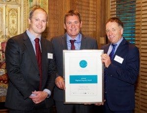 TQM's John Talbot and Brian Oliver receive their Tasmanian regional exporter award from Austrade's Ollie Shugg, left