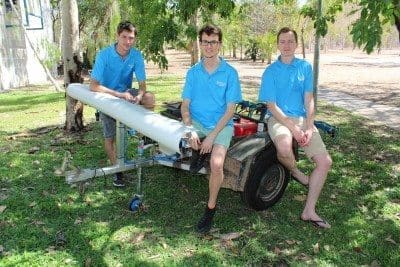 L to R Brendan Calvert, Jake Wood and Alex Olsen with the machine