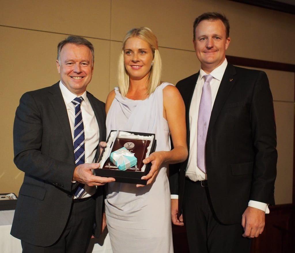 Shadow Minister for Agriculture Joel Fitzgibbon presents Emily Bryant from Argyle Downs in WA with the Ambassador of the Year award, with CEO Troy Setter