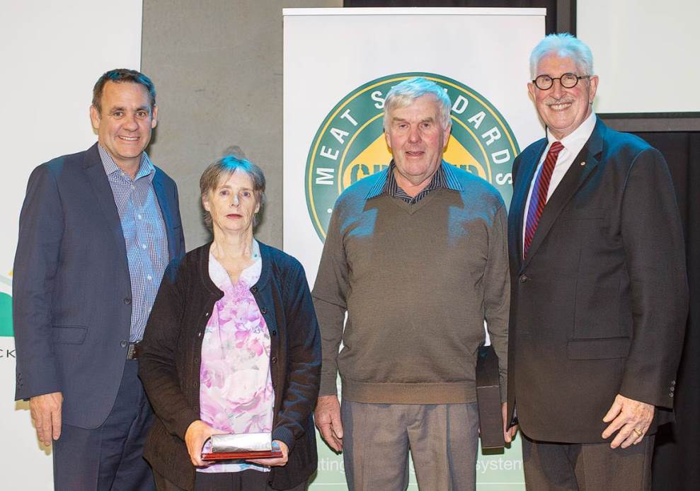 Phillip and Gaylene Hughes accept their Tasmanian MSA supplier of the year award last night from cricket great Max Walker and MLA managing director Richard Norton.