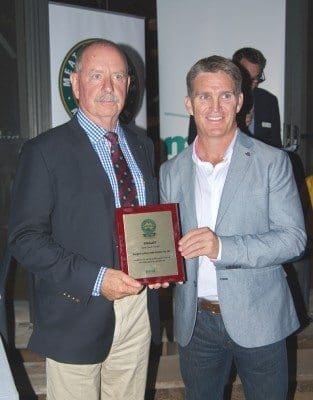 Rangers Valley's Don Mackay accepts the NSW MSA Supplier of the Year award last night from Wallabies great, Tim Horan.