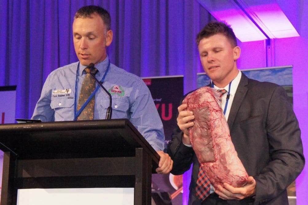 Auctioneers Enoch Bergman from Esperance WA and Colby Ede from Landmark Toowoomba knock down AA Co's marbling score 9+ striploin durin gthe charity auction held as part of the 2016 AWA national Conference dinner