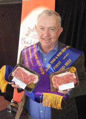 NH Foods' Pat Gleeson with the company's two winning entries - Manning Valley Naturally (grassfed class - Wingham beef Exports) and Oakey Reserve (grainfed class - Oakey Beef).