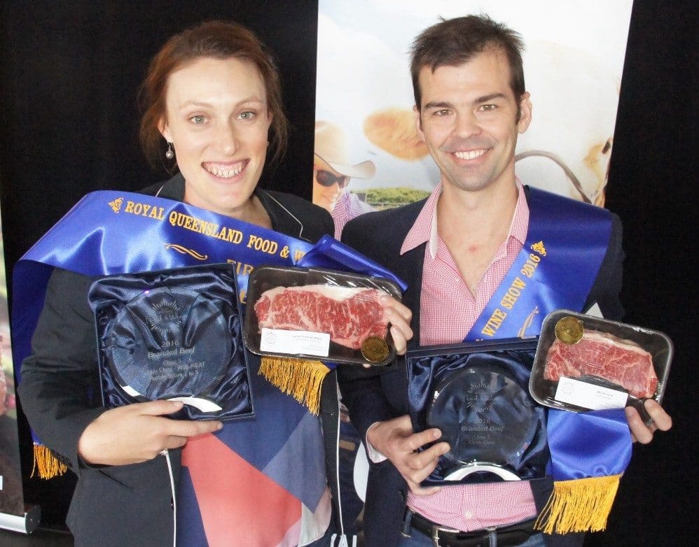 Andrews Meats' Kylie Schuller and JBS Australia's Brad de Luca with their respective Wagyu and open class-winning entries 