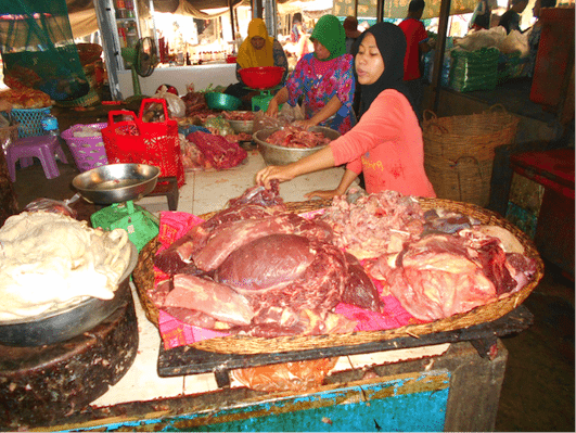 Muslim ladies run the beef section of the Psaler wet market in Siem Reap city.