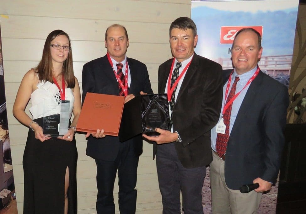 James Crossing from Angullong Pastoral Co receives his family’s overall winner’s award from Killara’s Tony Fitzgerald, Andrew Talbot and Jamie Austin.