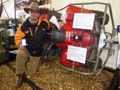 Victorian livestock producer Mark Gubbins with his four-wheeler rollover alert device. 